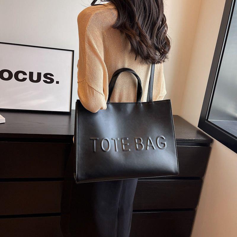 Structured leather tote bag for women, everyday elegance