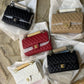 CHANEL JUMBO LEATHER SLING BAG