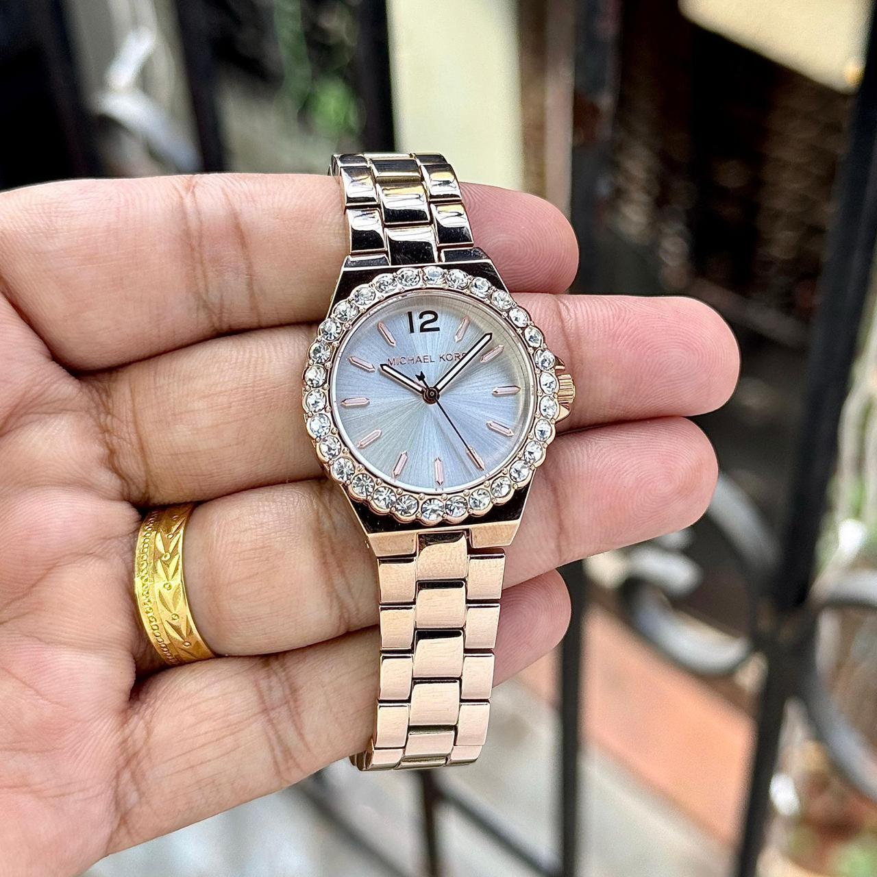Michael Kors Lennox luxury watch side view stainless steel clasp branding lock women