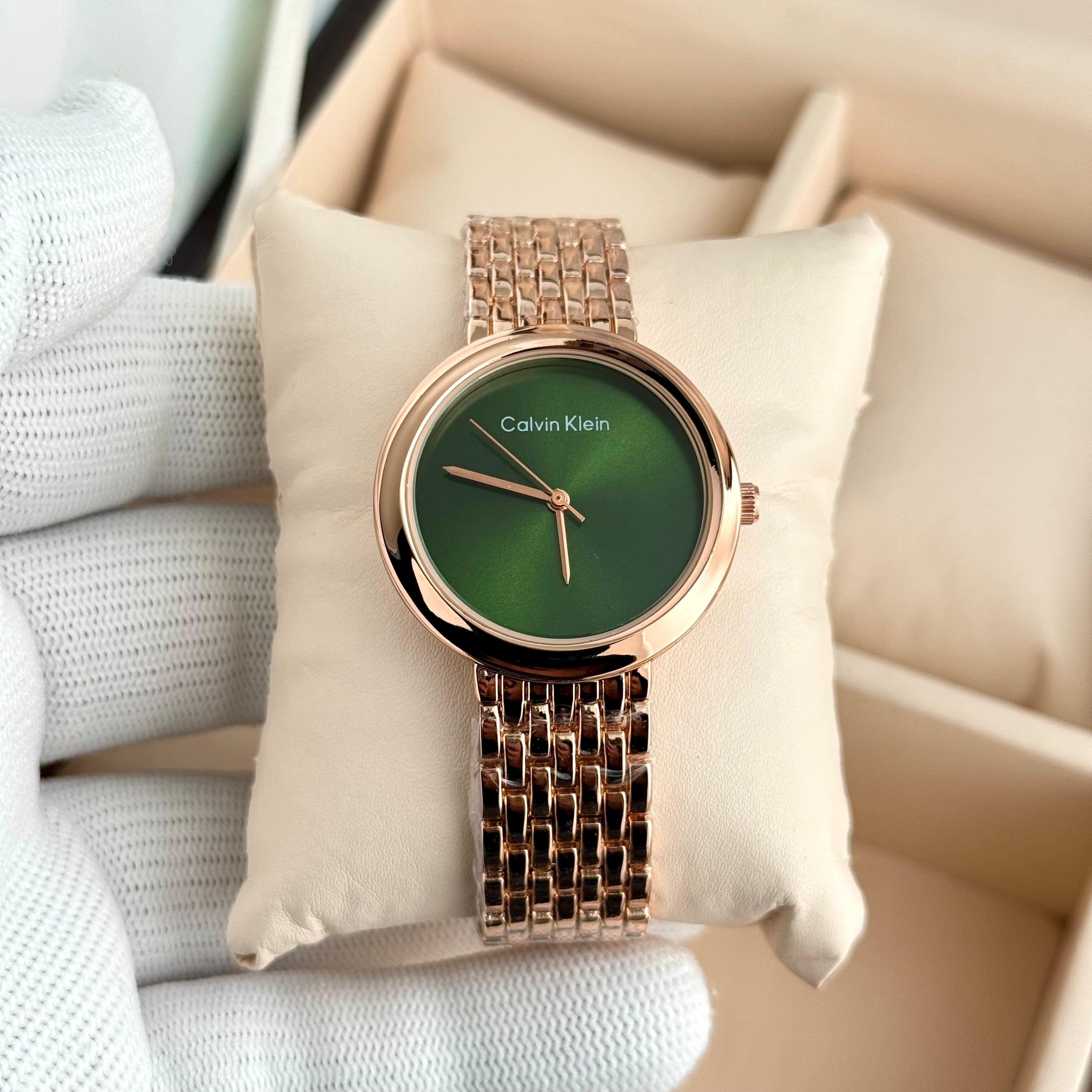 Calvin Klein CK watch D17 round dial close up buckle lock luxury women timepiece